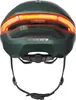 The back view of a green bicycle helmet with a red and orange LED light strip. Náhled obrázku produktu
