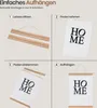 A four-panel diagram illustrating how to assemble and hang a poster using magnetic wooden strips. Produktbild-Vorschau