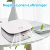 A white air purifier sits on a white table next to a book, with green leaves floating around it. Produktbild-Vorschau