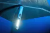 A blue LED pen light is attached to the inside of a tent, illuminating the interior. Náhled obrázku produktu