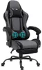 A gaming chair with a footrest and headrest, shown from a three-quarter view against a white background.