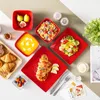 A table setting with a variety of food items and tableware, arranged attractively. Náhled obrázku produktu
