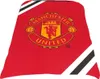 A close-up of a Manchester United FC branded item, likely bedding, with the club crest prominently displayed. Voir les images du produit