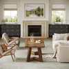 A living room scene with a coffee table, sofa, chairs, and a fireplace. Podgląd zdjęcia produktu