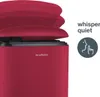 Close-up of a red trash can with a partially open lid, next to marketing text and an icon. Voir les images du produit