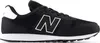 A side view of a black New Balance sneaker with a white 'N' logo. Voir les images du produit