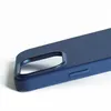 A close-up of a dark blue phone case, showing the camera cutout and a side button. Podgląd zdjęcia produktu
