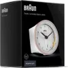 The image shows the packaging of a Braun radio-controlled alarm clock. The clock itself is visible through a cutout on the box. Anteprima dell’immagine prodotto