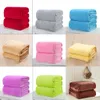 A collage of nine images, each showing two folded blankets of the same color. Produktbild-Vorschau