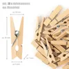 A collection of wooden clothespins with measurement indicators. Produktbild-Vorschau