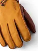 Close-up of a brown and tan leather glove. Produktbild-Vorschau
