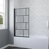 A shower screen for a bathtub in a bathroom with white tiled walls. Produktbild-Vorschau