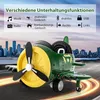 A toy airplane with various features listed in German text, set against a city skyline and road background. Voir les images du produit