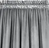 A close-up view of gray curtains with pleats at the top. Produktbild-Vorschau