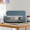 A Cricut cutting machine is shown on a wooden desk with various crafting supplies. Produktbild-Vorschau