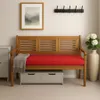 A wooden bench with a red cushion and a gray blanket, placed in a room with a painting and a vase of flowers. Produktbild-Vorschau