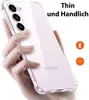 A hand holding a clear phone case on a white background. Produktbild-Vorschau
