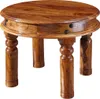 A round wooden coffee table with carved legs, photographed against a white background. Produktbild-Vorschau