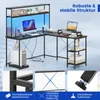 An L-shaped desk with shelves and a monitor stand, featuring LED lighting. Náhľad obrázku produktu