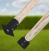 Two wooden posts with black metal bases are shown in a grassy outdoor setting. Produktbild-Vorschau