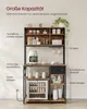 A kitchen shelf unit with various items, including a coffee maker, mugs, and a mini-fridge, with labels pointing out features. Produktbild-Vorschau