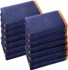 Two stacks of folded blue moving blankets with orange trim, presented on a white background. Anteprima dell’immagine prodotto