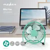 A mint green mini fan is placed on a desk in front of a laptop with a beach scene on its screen. There is also a notebook and pens on the desk. Below the fan are icons indicating its features: a fan symbol, 10cm diameter, 360-degree rotation, and metal con Podgląd zdjęcia produktu