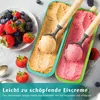 Two ice cream containers with scoops of ice cream and fresh berries. Produktbild-Vorschau
