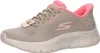 A side view of a single Skechers women's walking shoe. Voir les images du produit