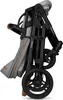 A folded stroller is shown against a white background. Anteprima dell’immagine prodotto