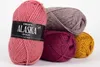 Several balls of yarn are stacked together against a white background. Produktbild-Vorschau