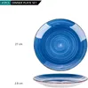 Two dinner plates are shown, one from a top-down view and another from a side view, with dimensions indicated. The top plate has a blue, swirled design. The side view shows the depth of the plate. Náhled obrázku produktu