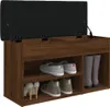 A shoe bench with storage and a lift-top lid, displaying various shoes on its shelves. Náhled obrázku produktu