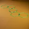A line of hexagonal agility rings on an orange floor. Náhled obrázku produktu