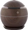 A dark brown, spherical aroma diffuser with a wood-grain texture and a power button symbol. Produktbild-Vorschau