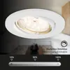 A close-up of a white LED recessed light fixture with a dimmer slider and percentage indicators below. Produktbild-Vorschau