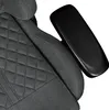 A close-up view of the armrest and quilted seat of a gray and black gaming chair. Produktbild-Vorschau