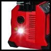 Close-up of a red and black power tool with a bright light illuminating the front. Voir les images du produit
