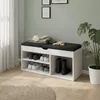 A shoe cabinet with a bench seat in a hallway, featuring shoes, boots, blankets, and gloves. Náhľad obrázku produktu