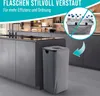 A modern kitchen with a gray trash can for recycling bottles. Podgląd zdjęcia produktu