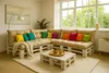 A modern living room with a pallet sofa and coffee table. Anteprima dell’immagine prodotto
