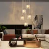 A modern living room with a sectional sofa, coffee table, and a large abstract artwork. Produktbild-Vorschau