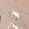 A close-up view of two drawers on a light brown metal roll container. Voir les images du produit