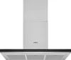 A stainless steel kitchen hood with a black control panel. Voir les images du produit