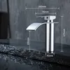 A chrome waterfall faucet with dimensions indicated by white lines and text. Produktbild-Vorschau