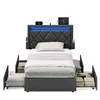 A modern bed frame with integrated LED lighting and charging station, shown against a white background with storage drawers pulled out. Produktbild-Vorschau