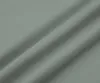 A close-up, angled view of a gray fabric with visible folds and texture. Produktbild-Vorschau