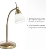 A brass desk lamp with a white glass shade is shown against a white background, with text describing its features. Produktbild-Vorschau
