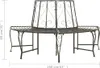 A metal tree bench with a curved seat and backrest, shown from the front. Náhled obrázku produktu