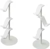 Two white multi-tiered stands for holding items like controllers or headsets, shown against a white background. Produktbild-Vorschau